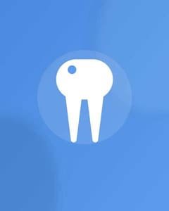 Chirurgien-dentiste et son assistante en salle de soins
